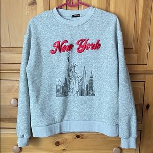 Angel Cult  New York embossed Graphic Crewneck Sweatshirt